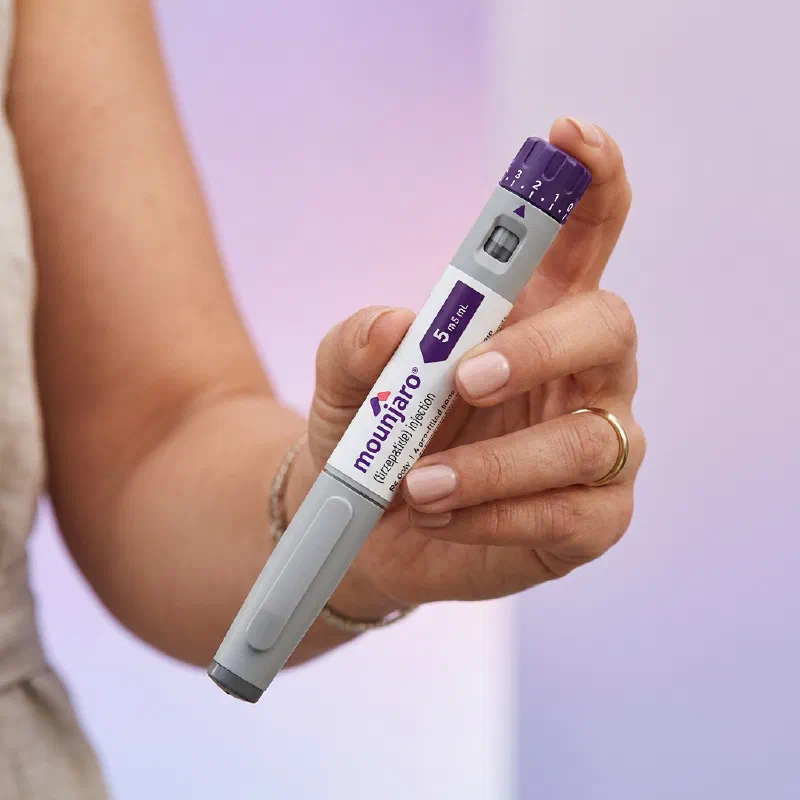 Mounjaro weight loss injection pen in hand